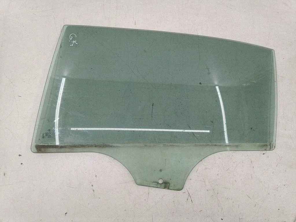 Rear door window glass – left