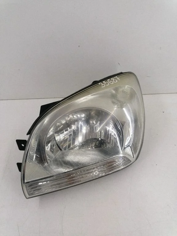 Headlight/headlamp – left