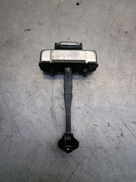 Front door check strap stopper – right