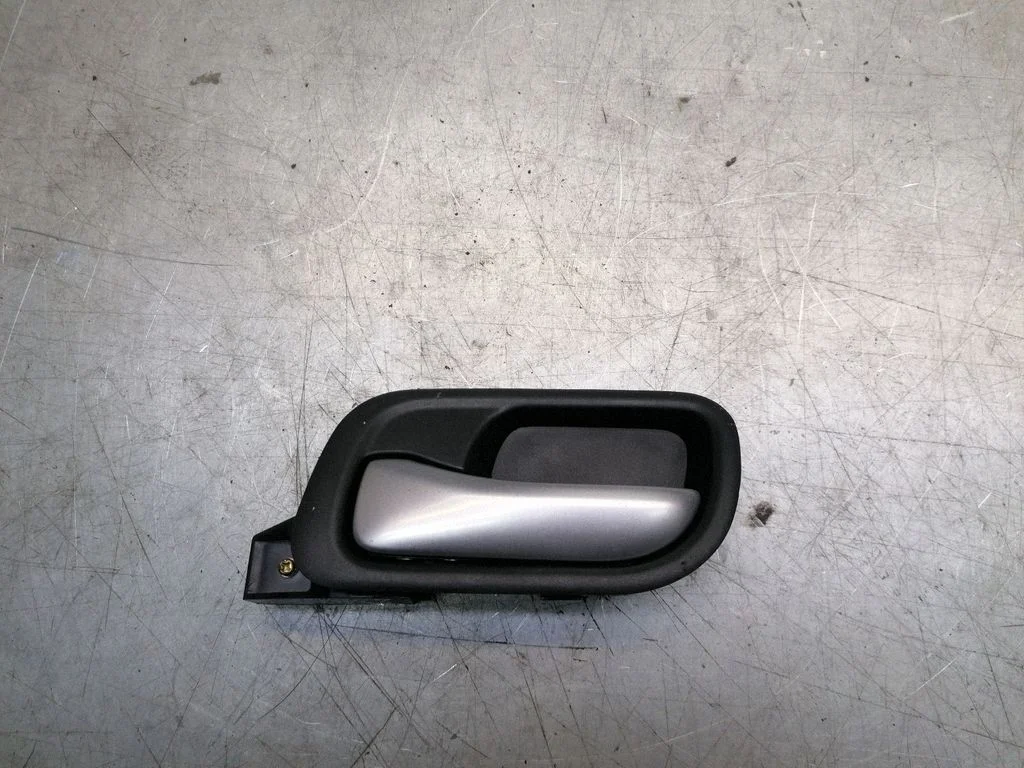 Front door interior handle – left