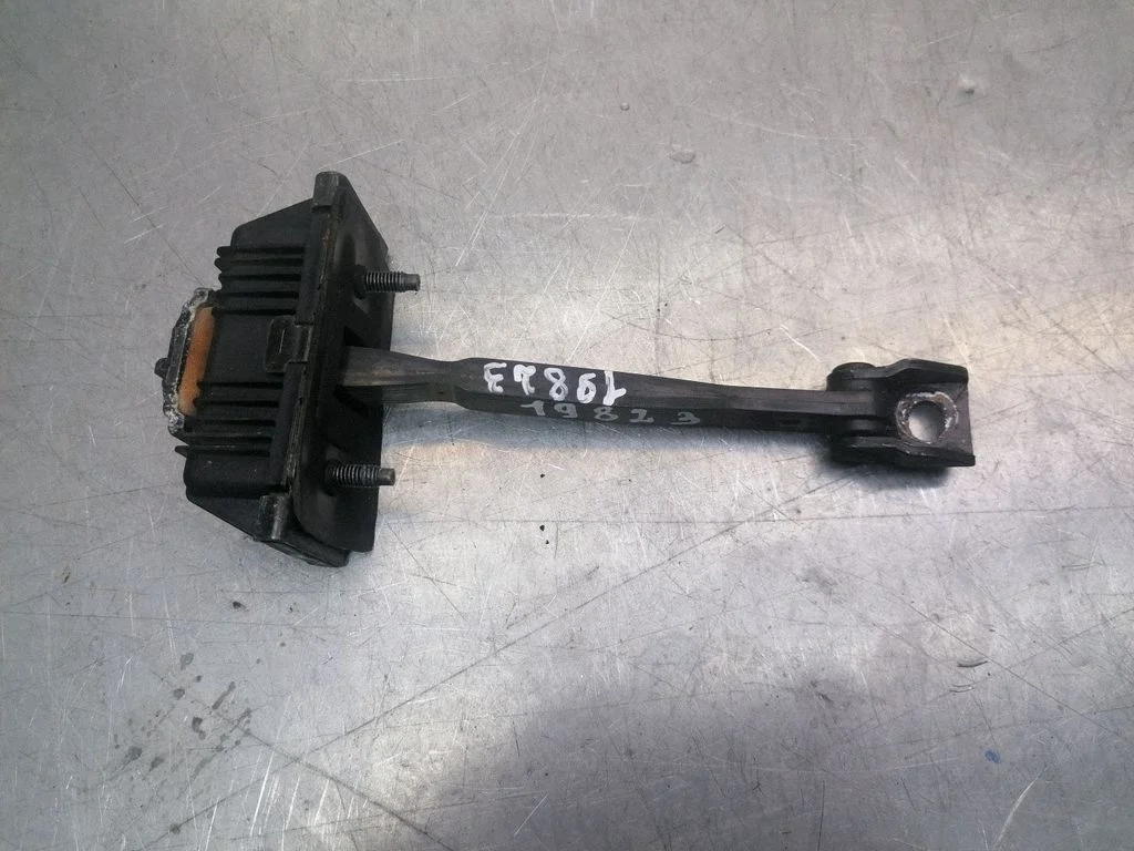 Rear door check strap stopper 8X23F27200AB
