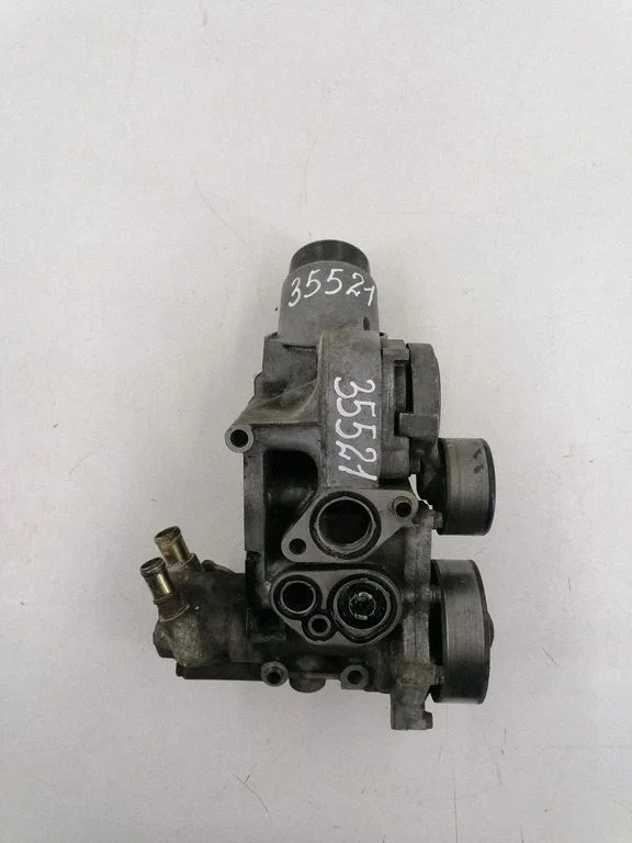 Oil filter mounting bracket