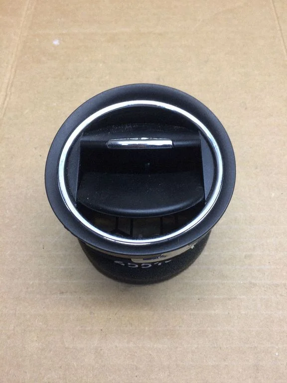 Dash center air vent grill