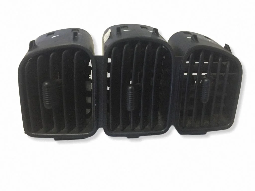 Dash center air vent grill 05009038AA