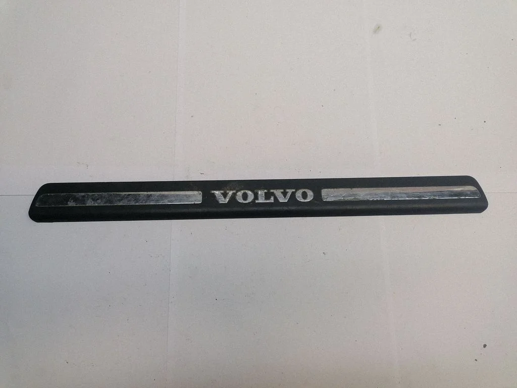 Front sill trim cover 8659960