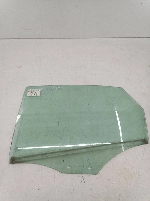 Rear door window glass – left
