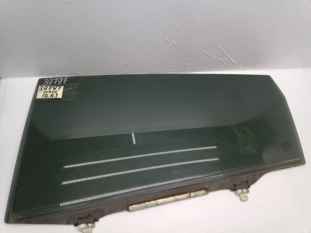 Rear door window glass – left