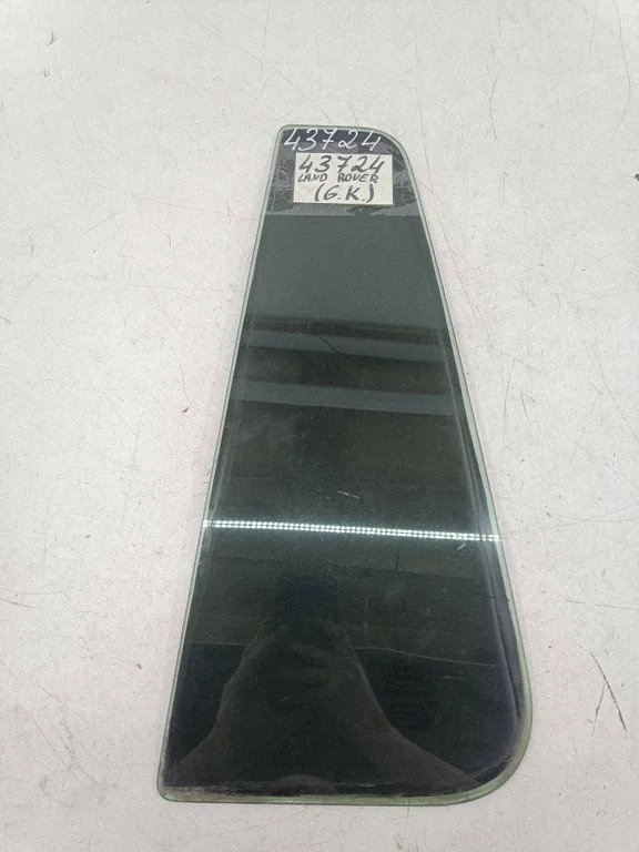 Rear vent window glass – left