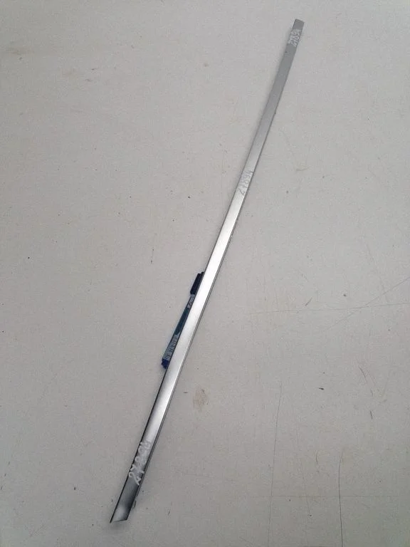 Rear door glass trim molding – left