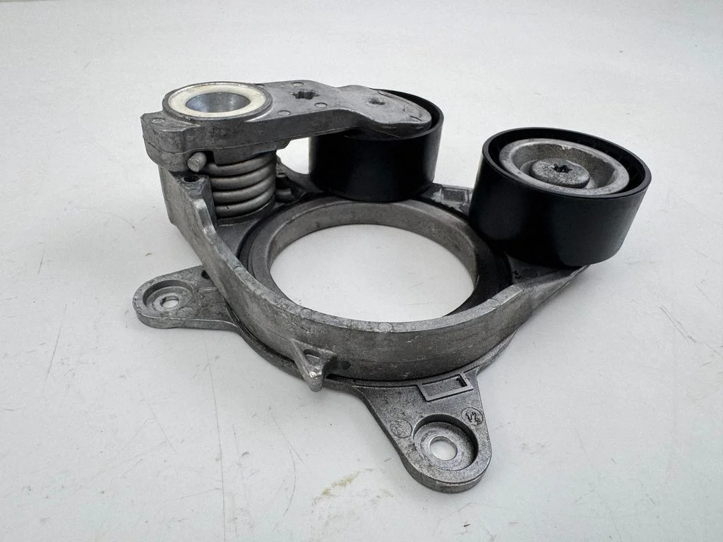 Generator/alternator belt tensioner