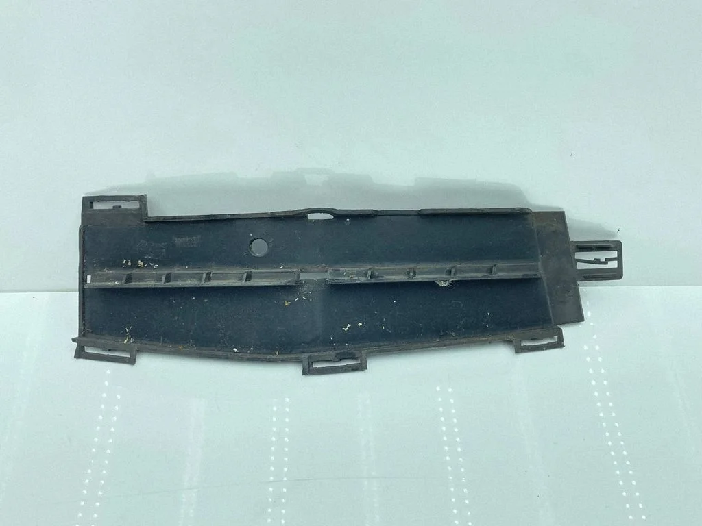 Front fog light trim/grill 7385263