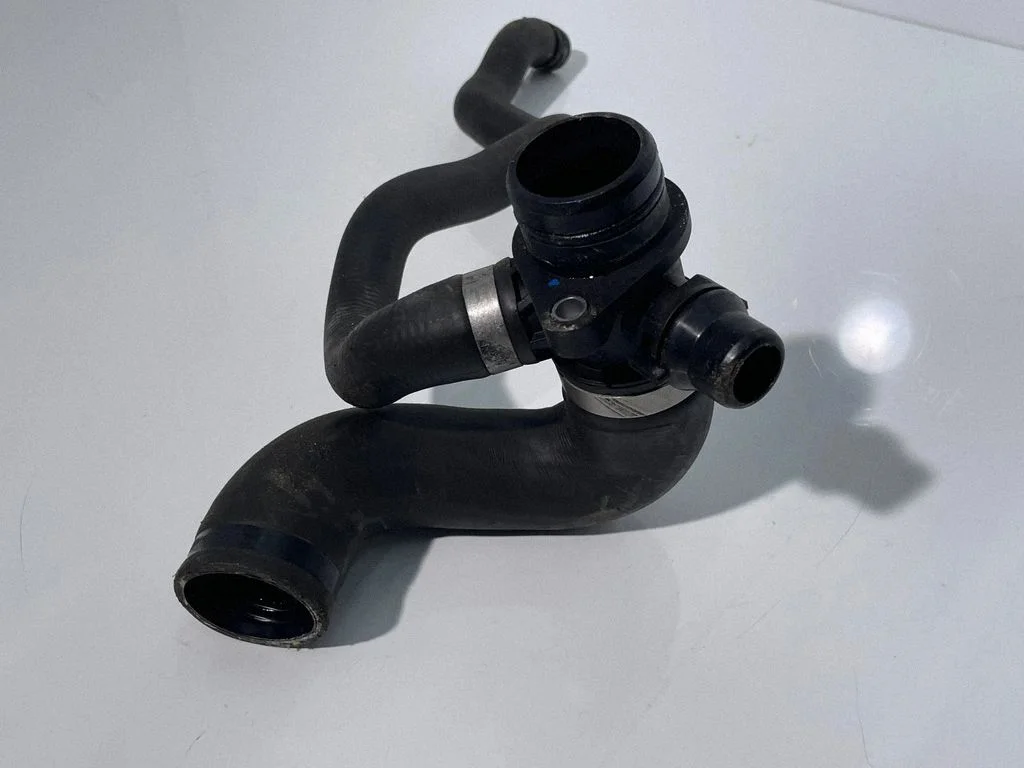 Engine coolant pipe/hose 7639997