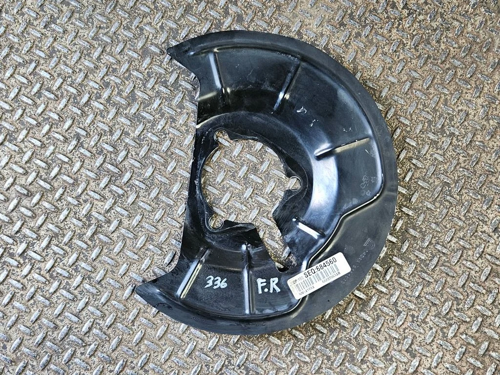 Front brake disc dust cover plate 68237063AB