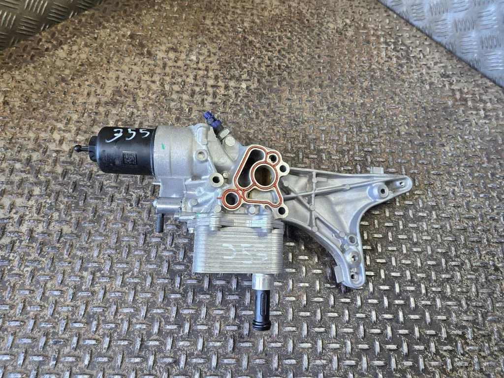Oil filter mounting bracket – Volkswagen Tiguan Allspace (2017-)