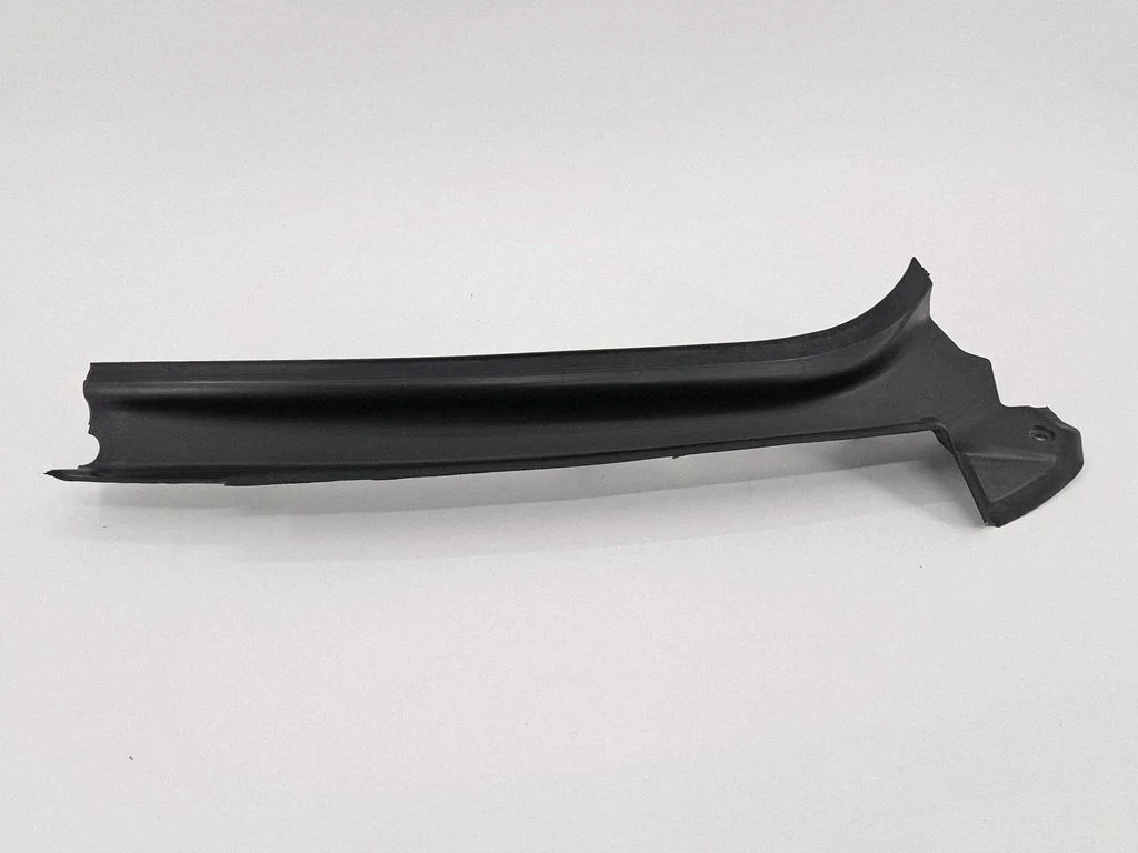 Kita bagažinės apdailos detalė