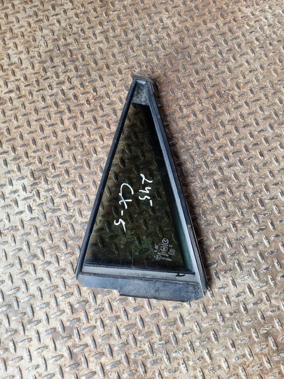 Rear vent window glass – left