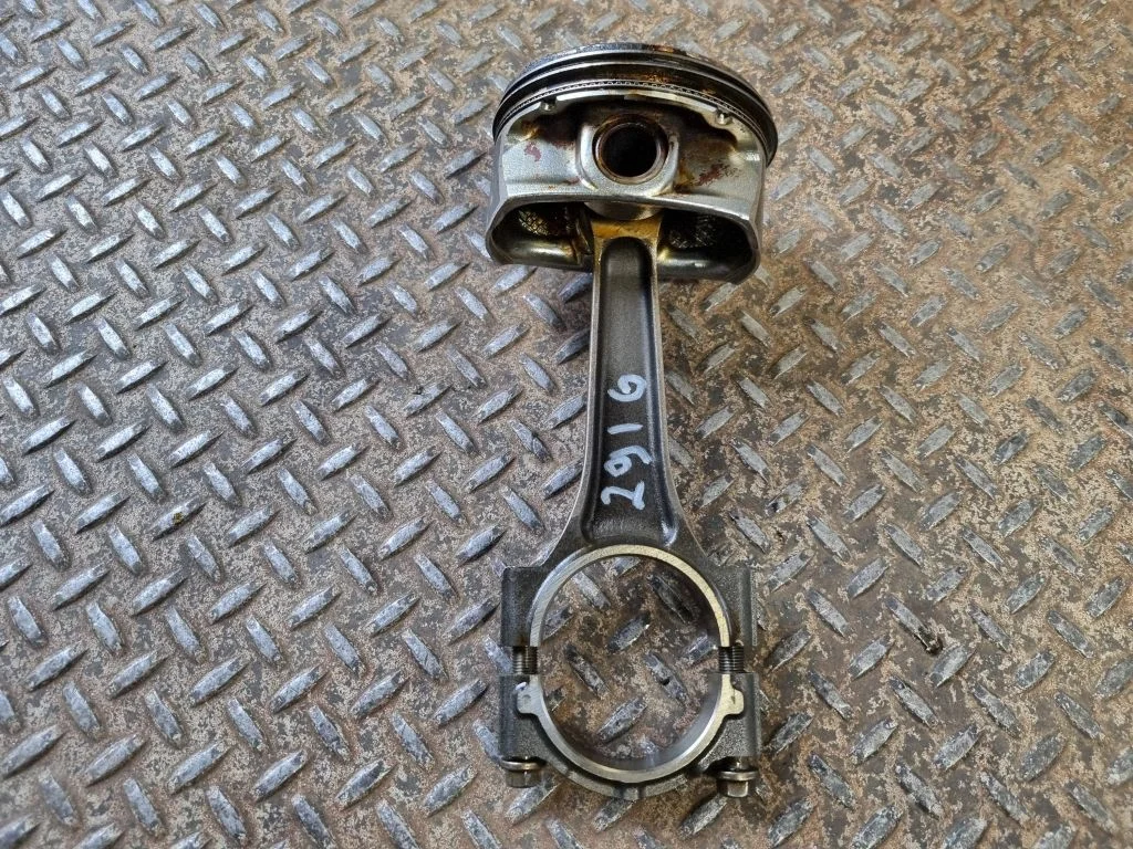 Piston with connecting rod