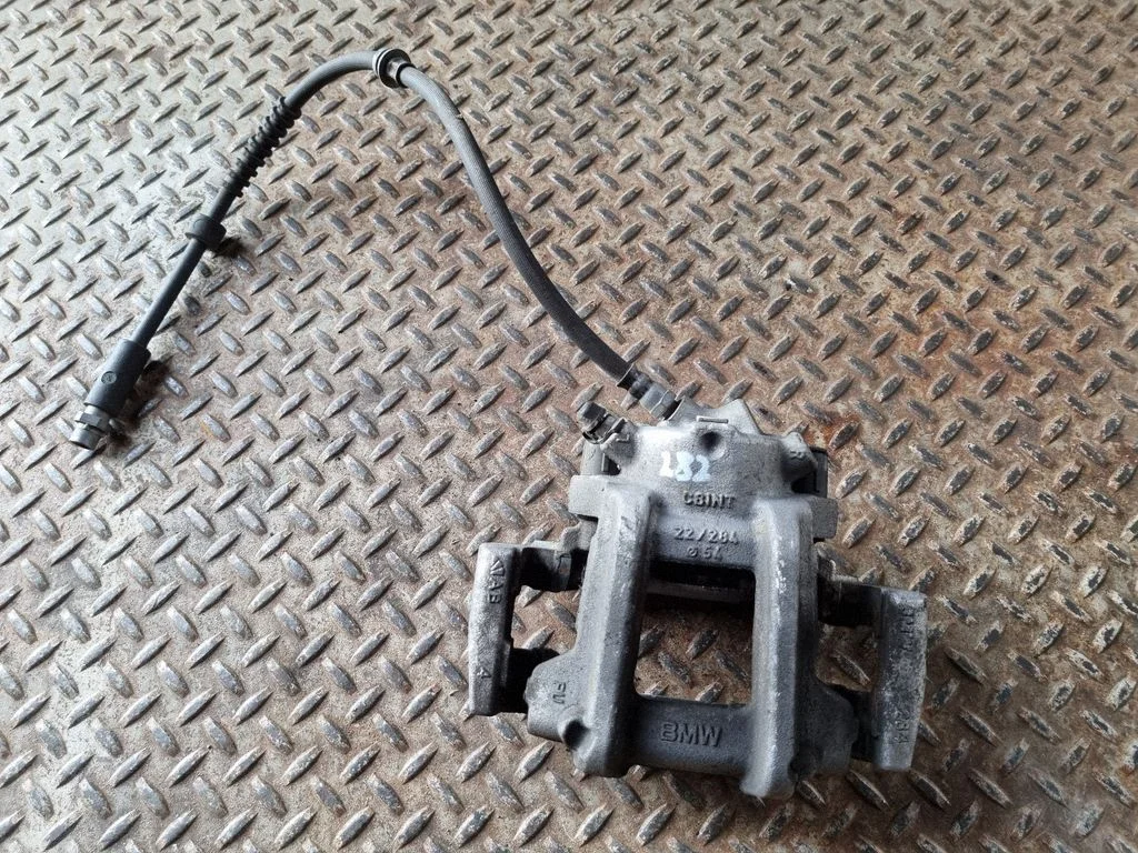 Front brake caliper – left