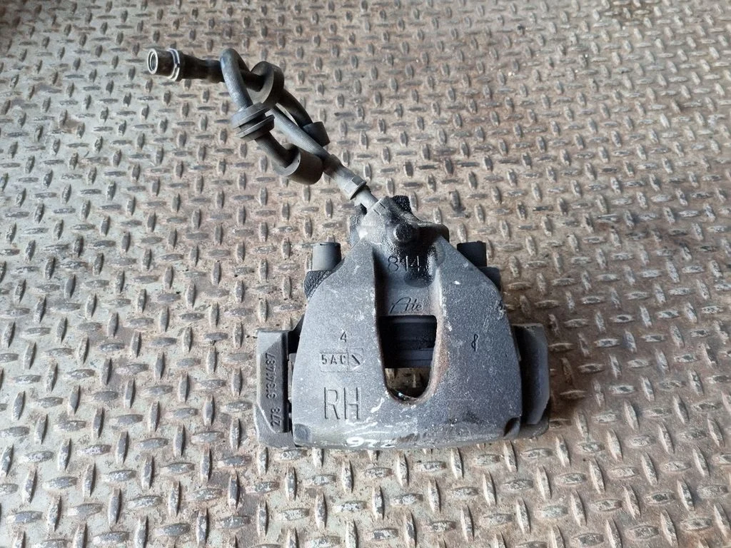 Front brake caliper 31341487