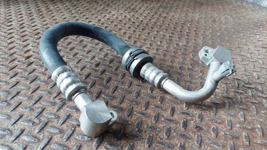 Air conditioning (A/C) pipe/hose 9321603