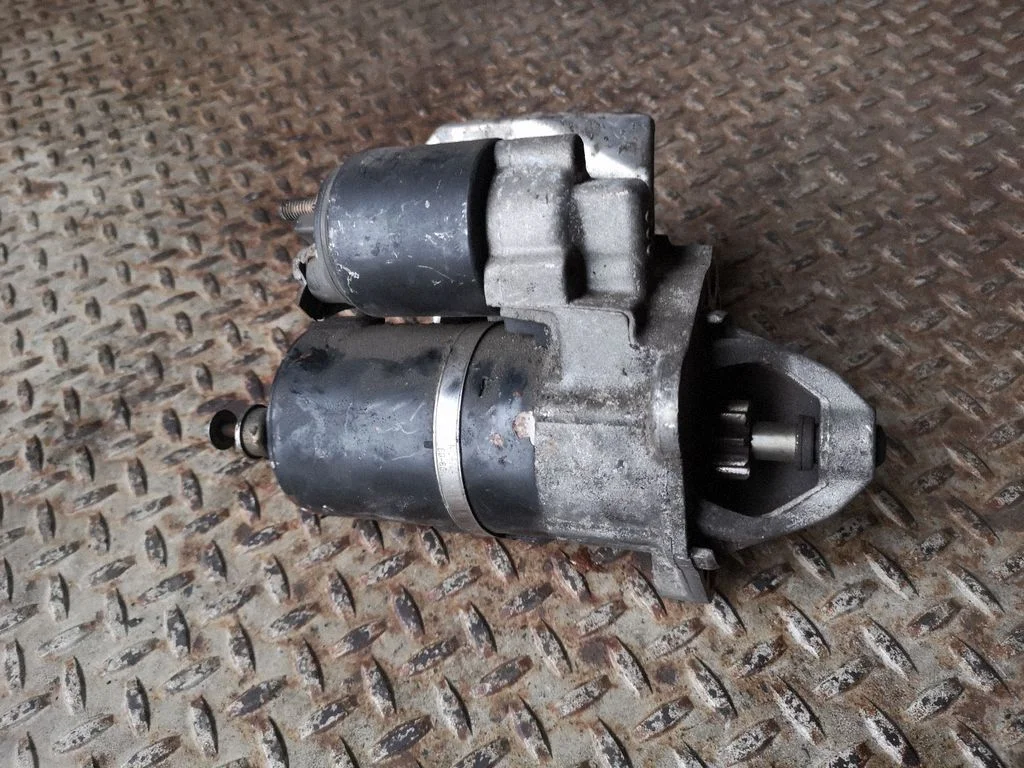 Starter motor 06B911023