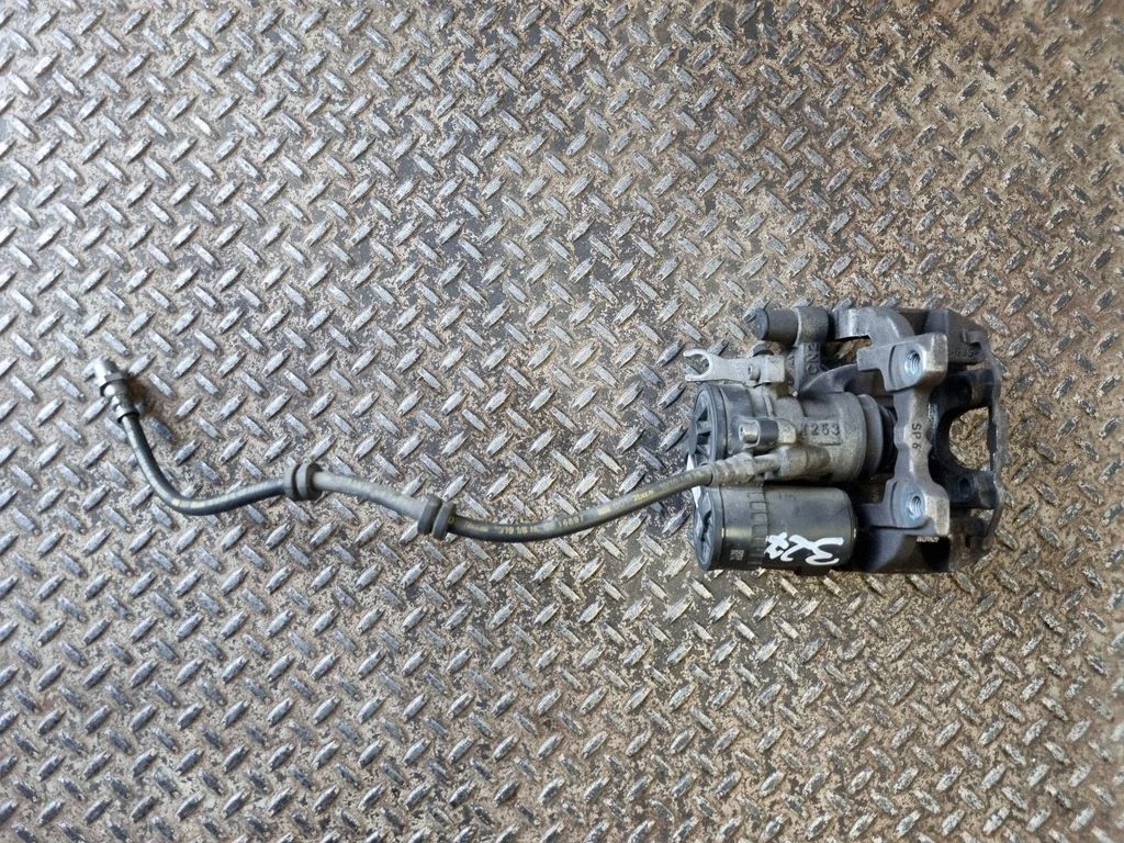 Rear brake caliper 6883027