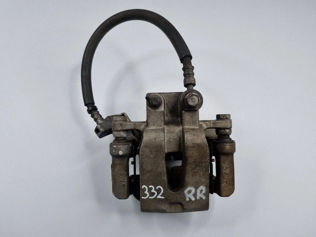 Rear brake caliper – right