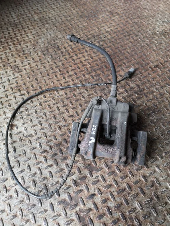 Rear brake caliper – right
