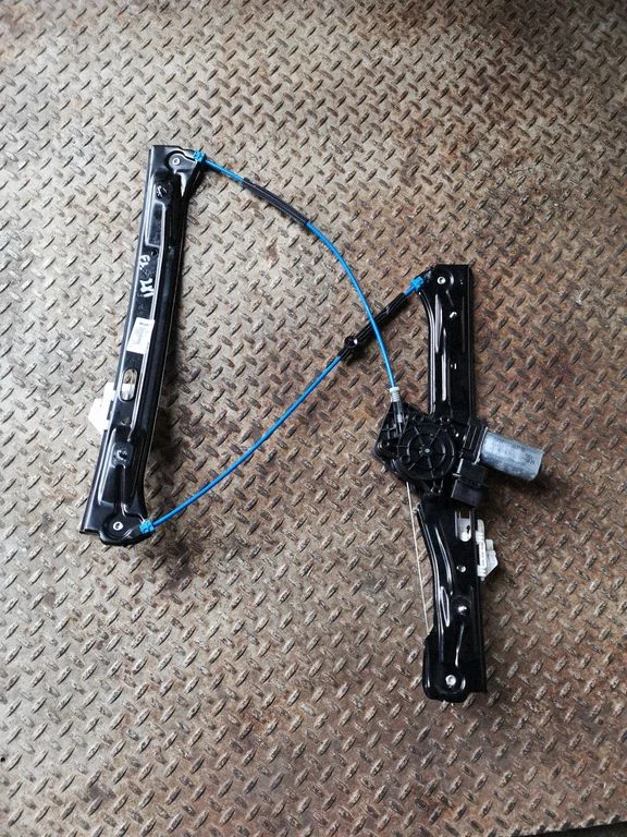 Front door window regulator with motor 7259823