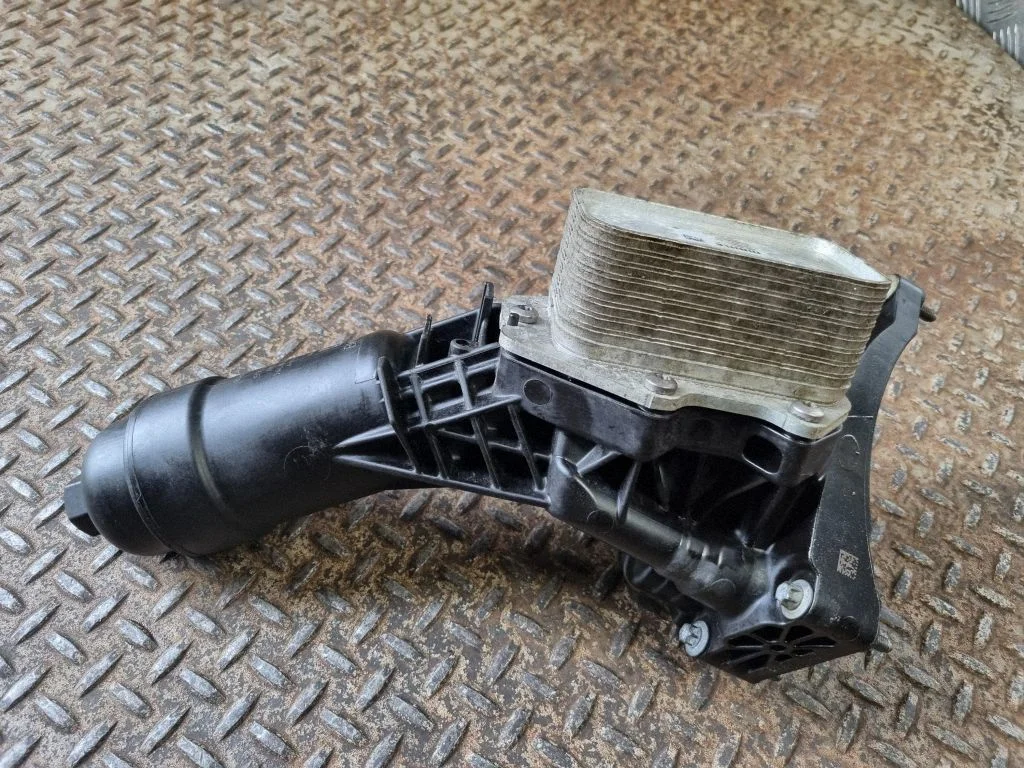 Oil filter mounting bracket 8580414