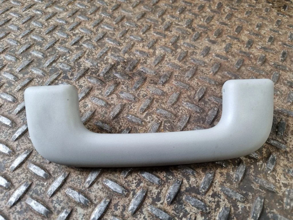 Front interior roof grab handle