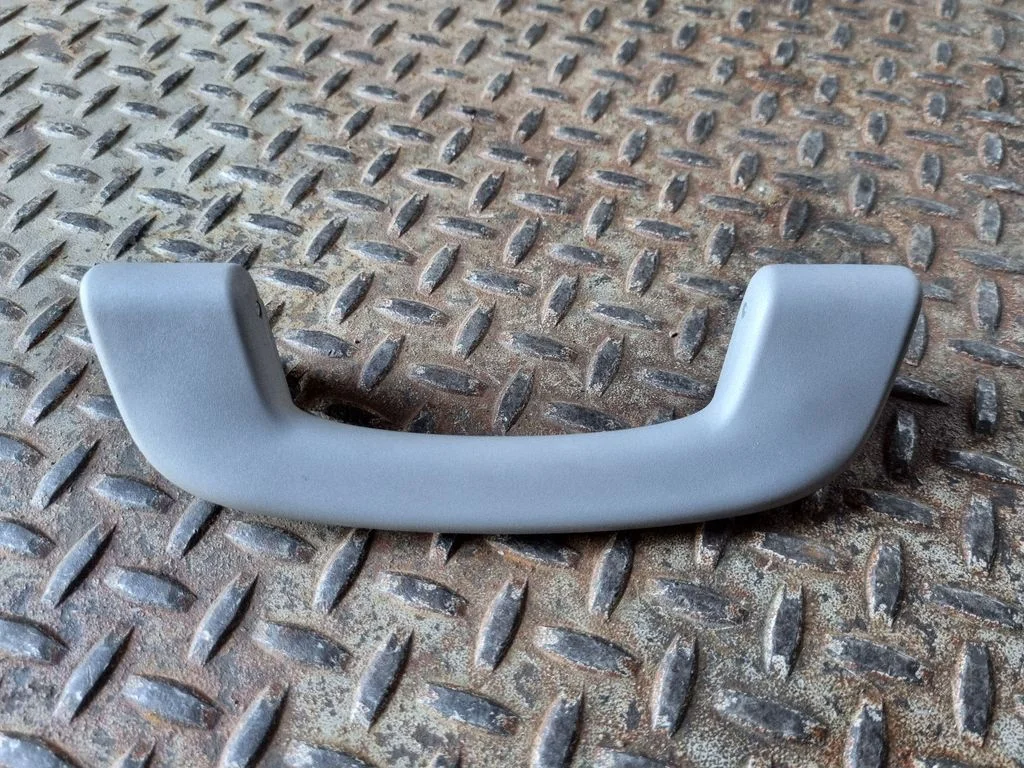 Front interior roof grab handle