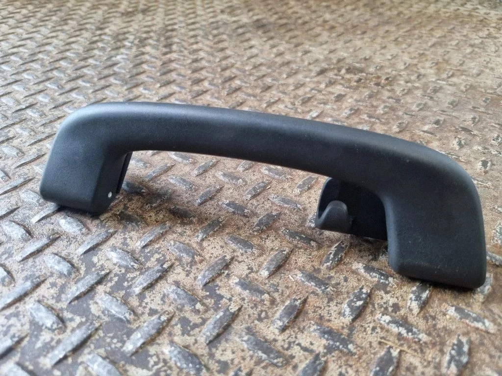 Rear interior roof grab handle – left