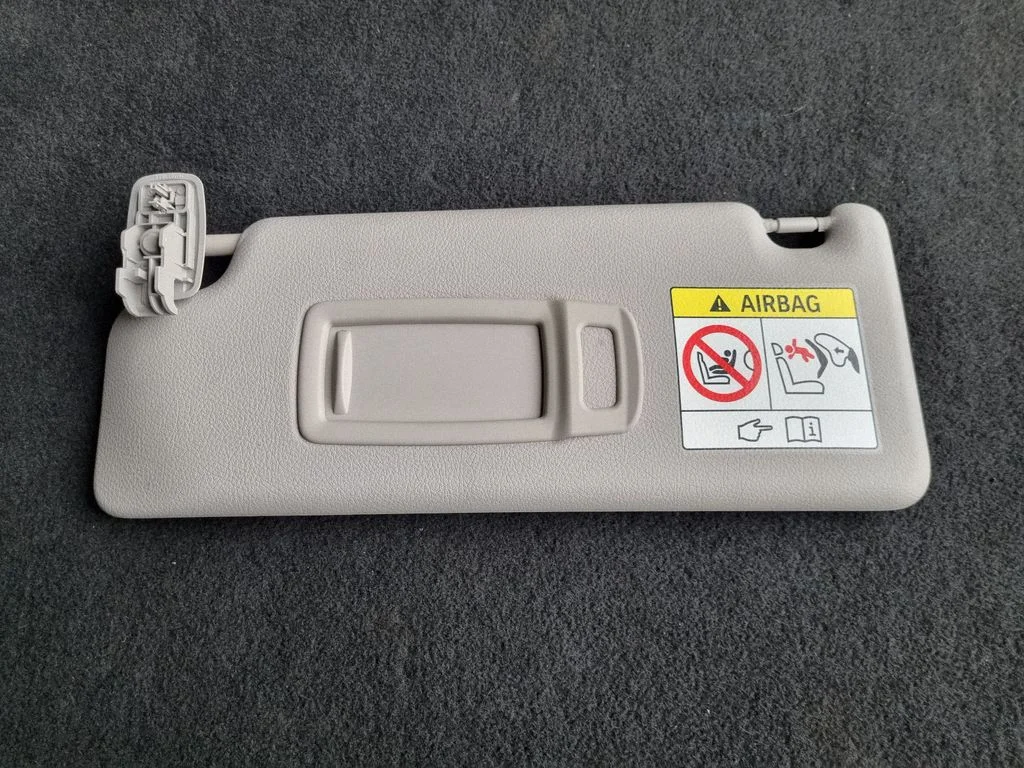 Sun visor – left