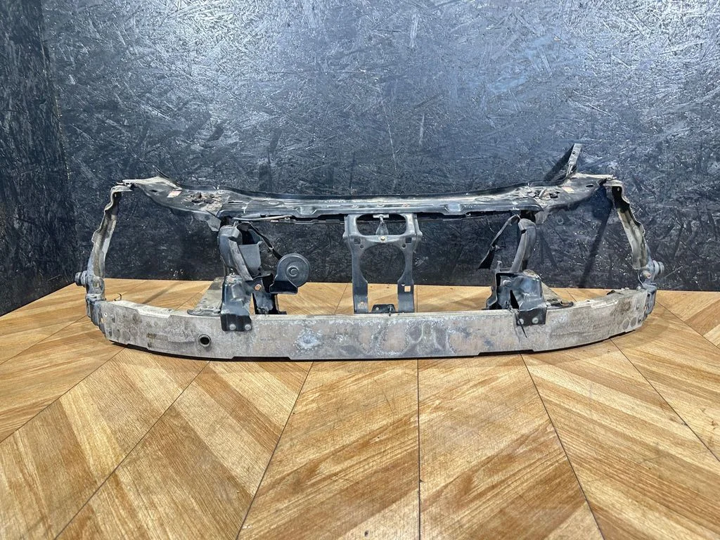Radiator support slam panel