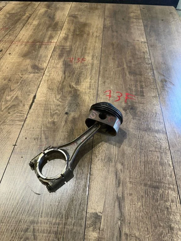 Piston with connecting rod