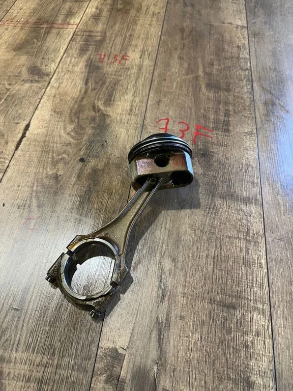 Piston with connecting rod