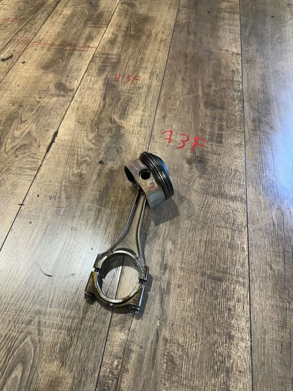 Piston with connecting rod