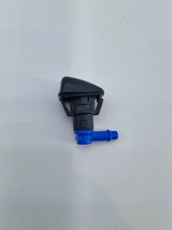 Windshield washer spray nozzle – front