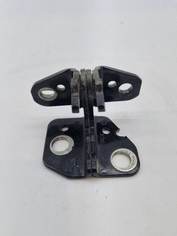 Rear door lower hinge – right