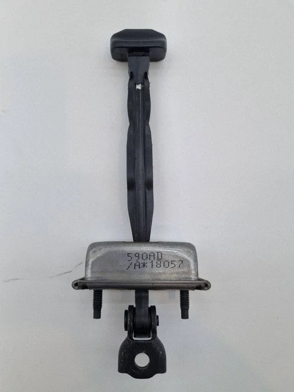 Rear door check strap stopper 590AD