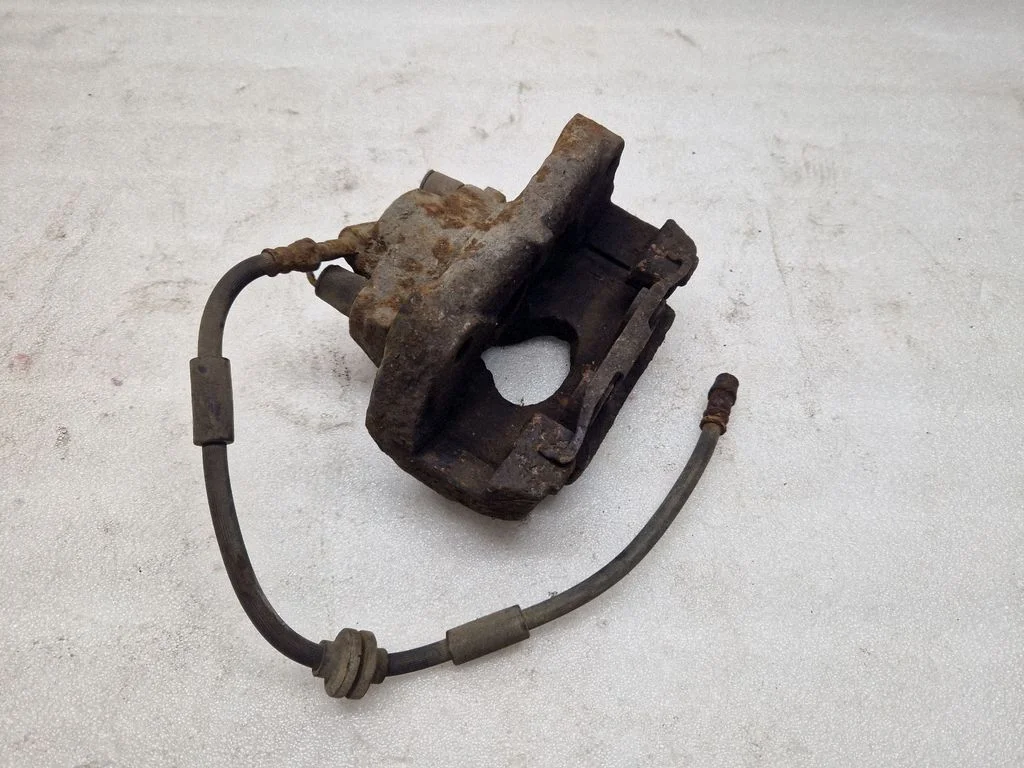 Front brake caliper – front left