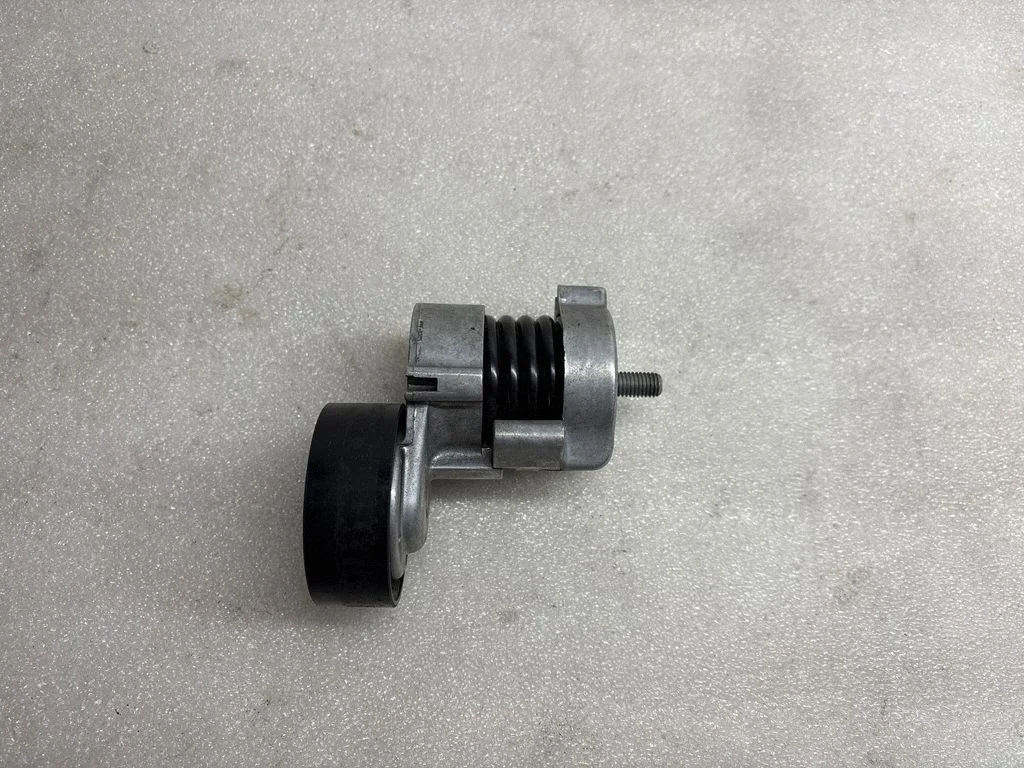 Generator/alternator belt tensioner