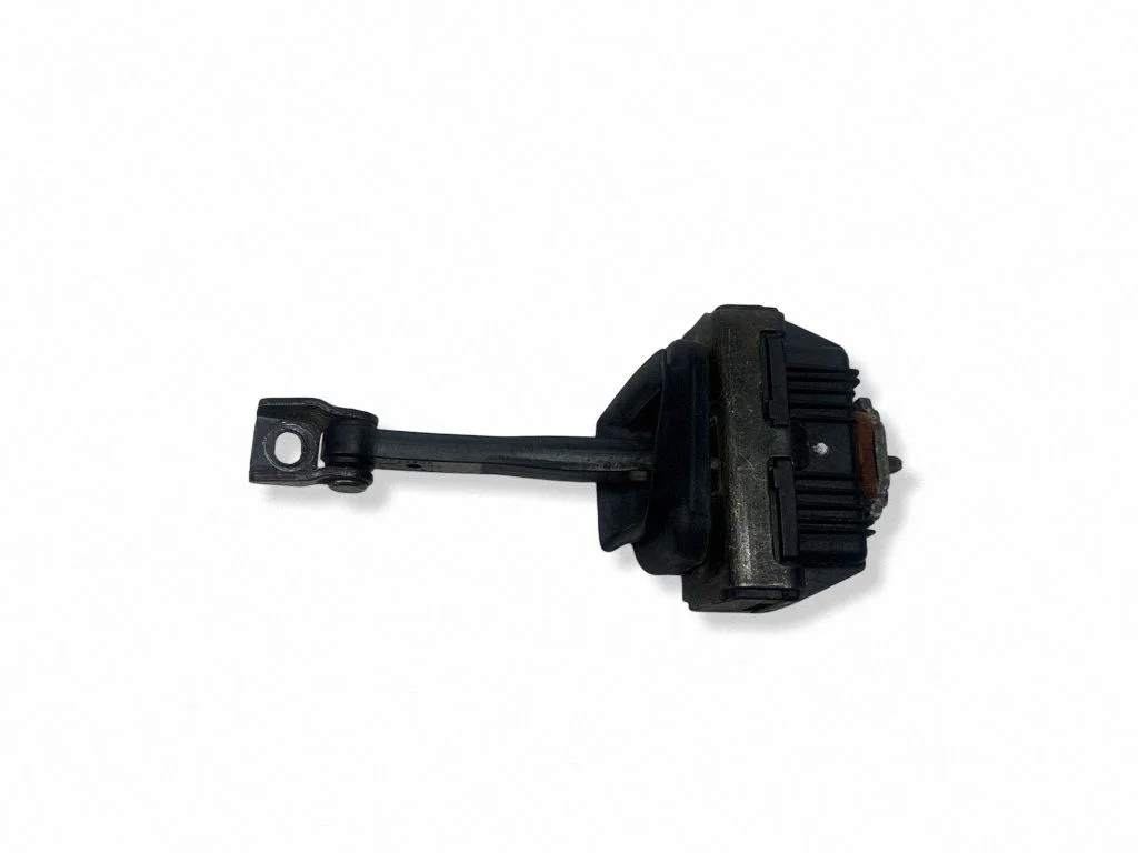 Front door check strap stopper 7033609