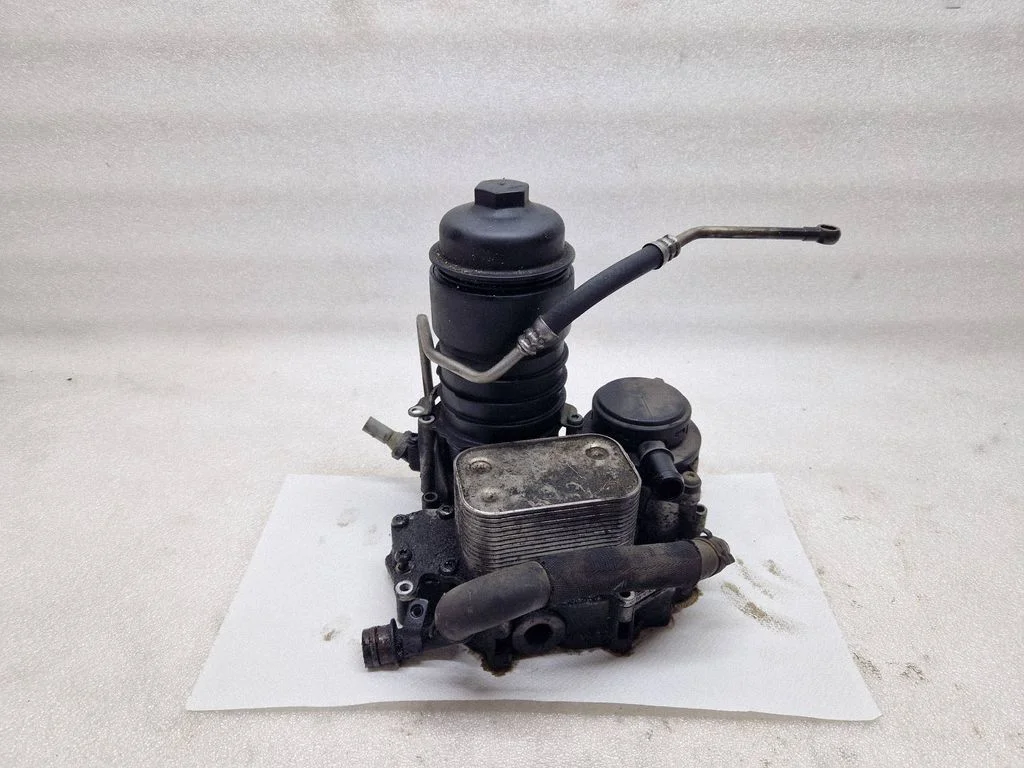 Oil filter mounting bracket 8558686
