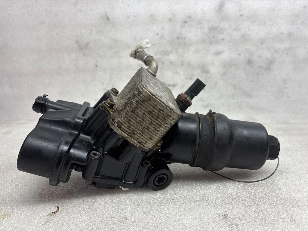 Oil filter mounting bracket – Volkswagen Passat B6 (2005-2010)