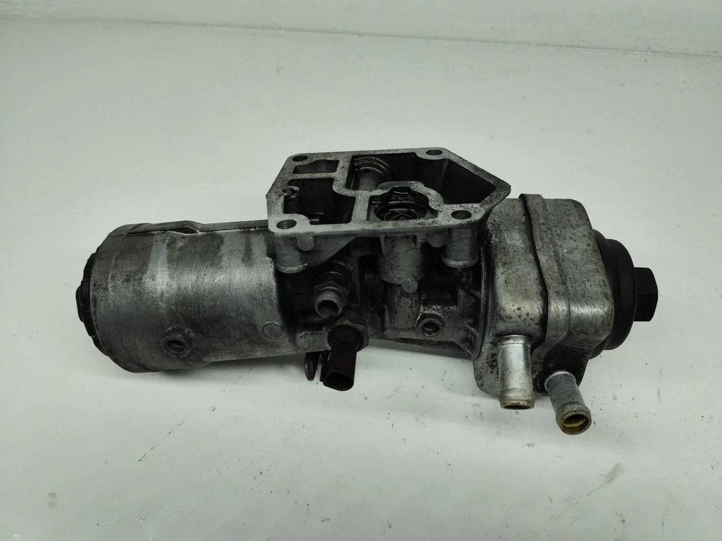 Oil filter mounting bracket 045115389J