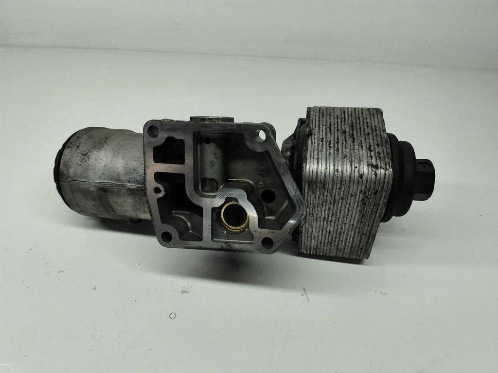 Oil filter mounting bracket 045115389J