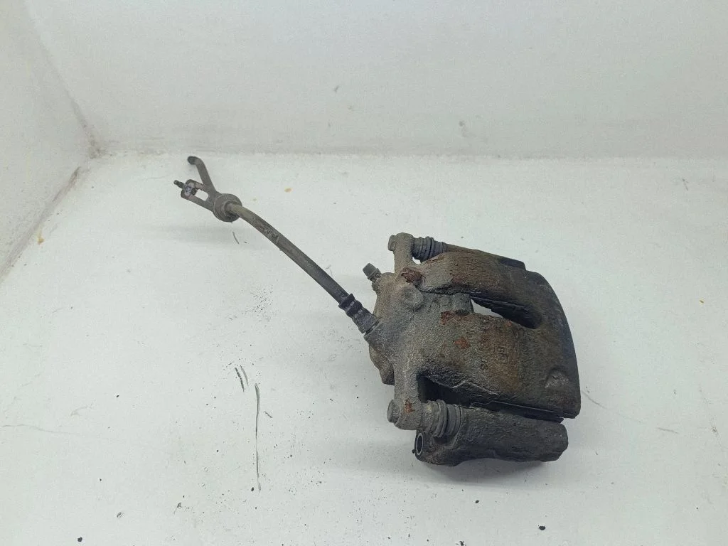 Front brake caliper – left