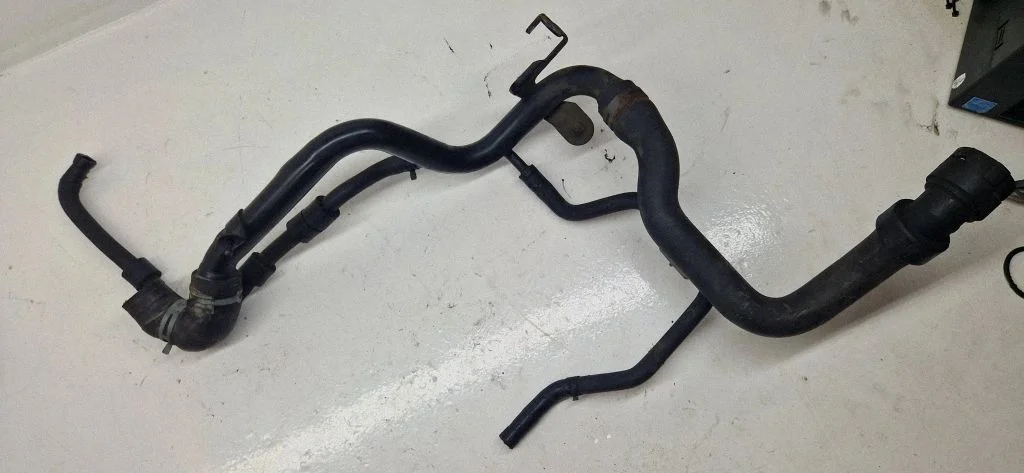 Engine coolant pipe/hose – Volkswagen Passat B5.5 (2001-2005)